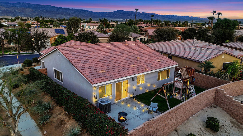 84285 Tramonto Way Indio, CA 92203 - Photo 40 of 63 an aerial view of a house with a yard