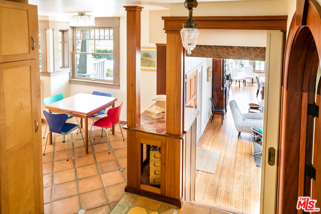 239 West Channel Road Santa Monica, CA 90402 - Photo 13 of 30 a balcony with glass top table and chairs