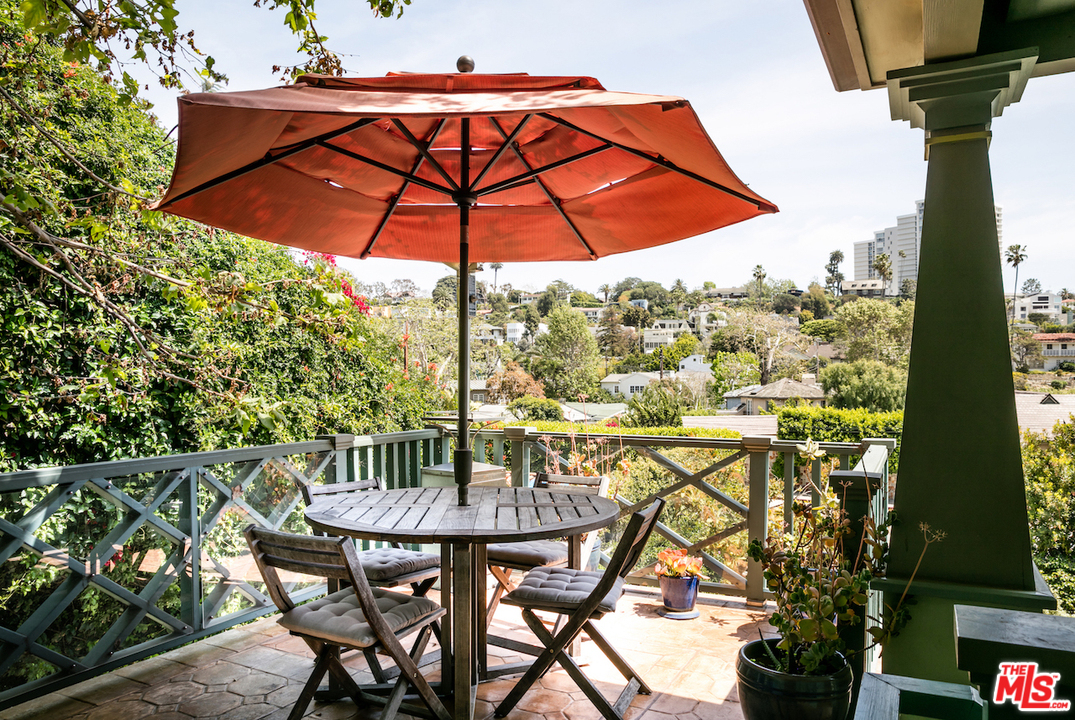 239 West Channel Road Santa Monica, CA 90402 - Photo 22 of 30 a table and chairs in the patio