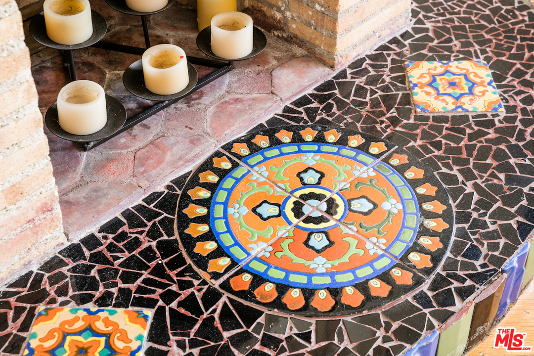 239 West Channel Road Santa Monica, CA 90402 - Photo 6 of 30 a bathroom with a sink and a mirror