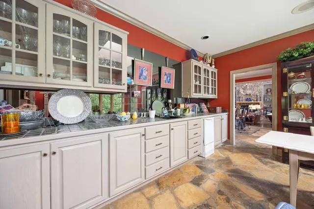 a view of a two chairs in the balcony