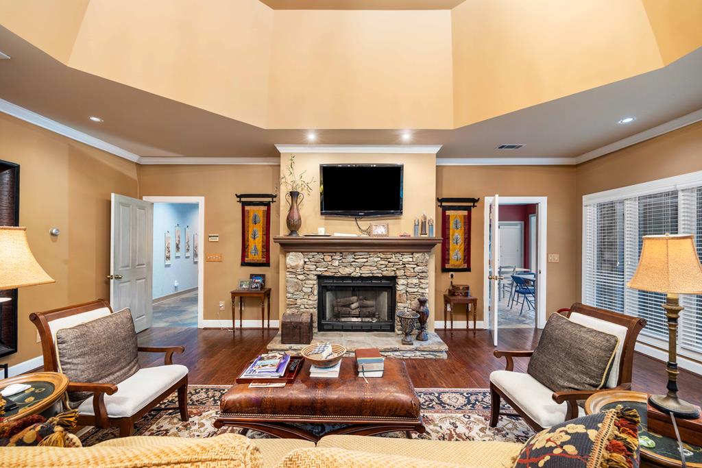 1140 Central Church Road Midland, GA 31820 - Photo 23 of 74 a living room with furniture and a fireplace