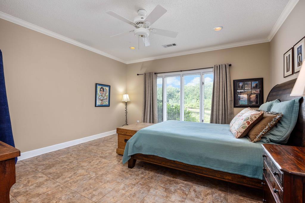 1140 Central Church Road Midland, GA 31820 - Photo 28 of 74 a bedroom with a bed and a window