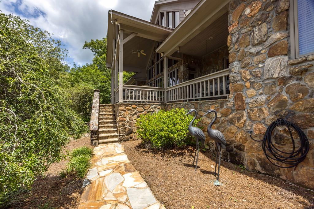 1140 Central Church Road Midland, GA 31820 - Photo 37 of 74 a view of a pathway of a house with flower garden