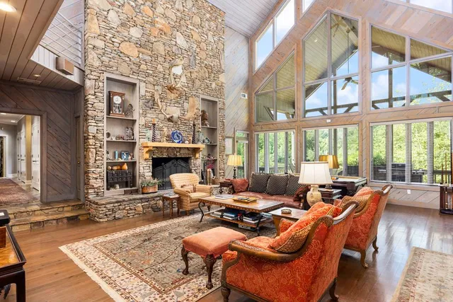 a outdoor living space with furniture and a fireplace