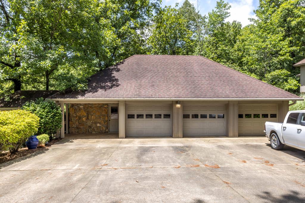 1140 Central Church Road Midland, GA 31820 - Photo 46 of 74 a front view of a house with a garage