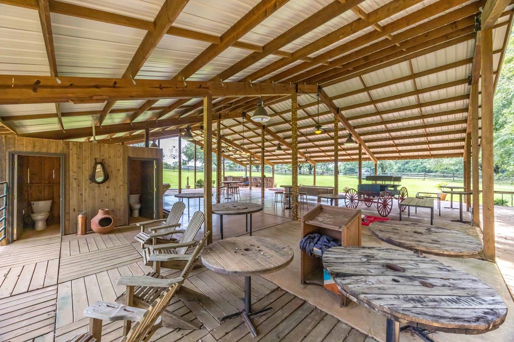 1140 Central Church Road Midland, GA 31820 - Photo 61 of 74 a living room with furniture and a chandelier