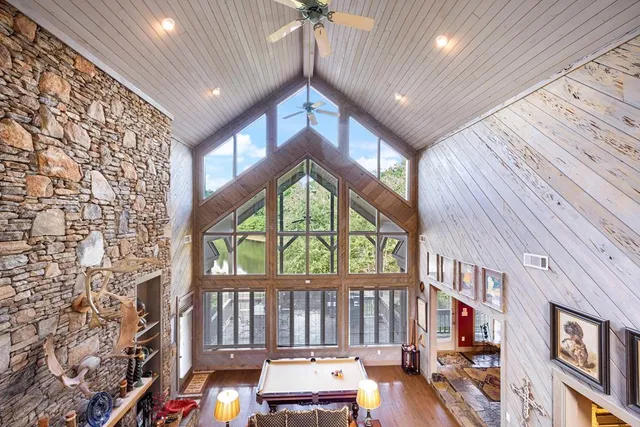 a stove top oven sitting inside of a kitchen