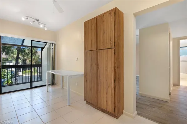 a view of a bathroom with a tub and shower