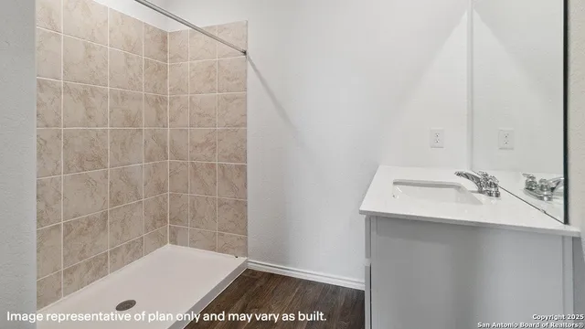 a bathroom with a sink and a bathtub