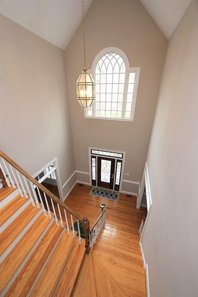 8617 Cold Springs Road Raleigh, NC 27615 - Photo 18 of 30 There is another staircase from the kitchen to the second floor, Staircase