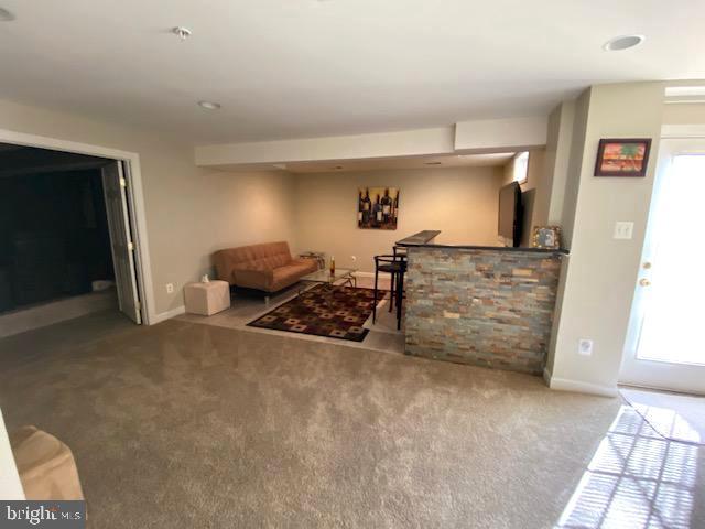 8009 Kingsmill Road Brandywine, MD 20613 - Photo 19 of 24 Basement recreation area