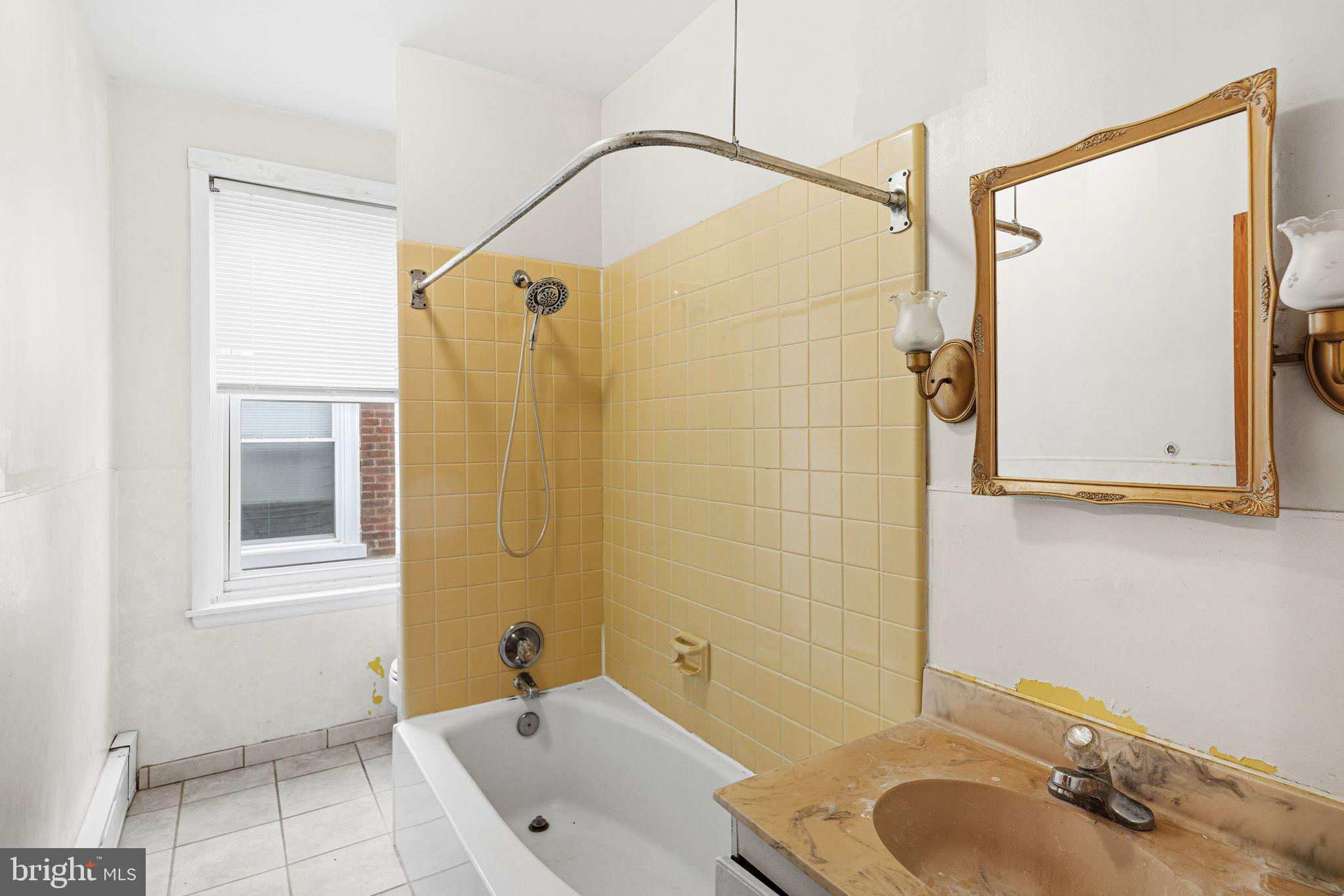 542 Martin Street Philadelphia, PA 19128 - Photo 11 of 16 a bathroom with a sink and a mirror