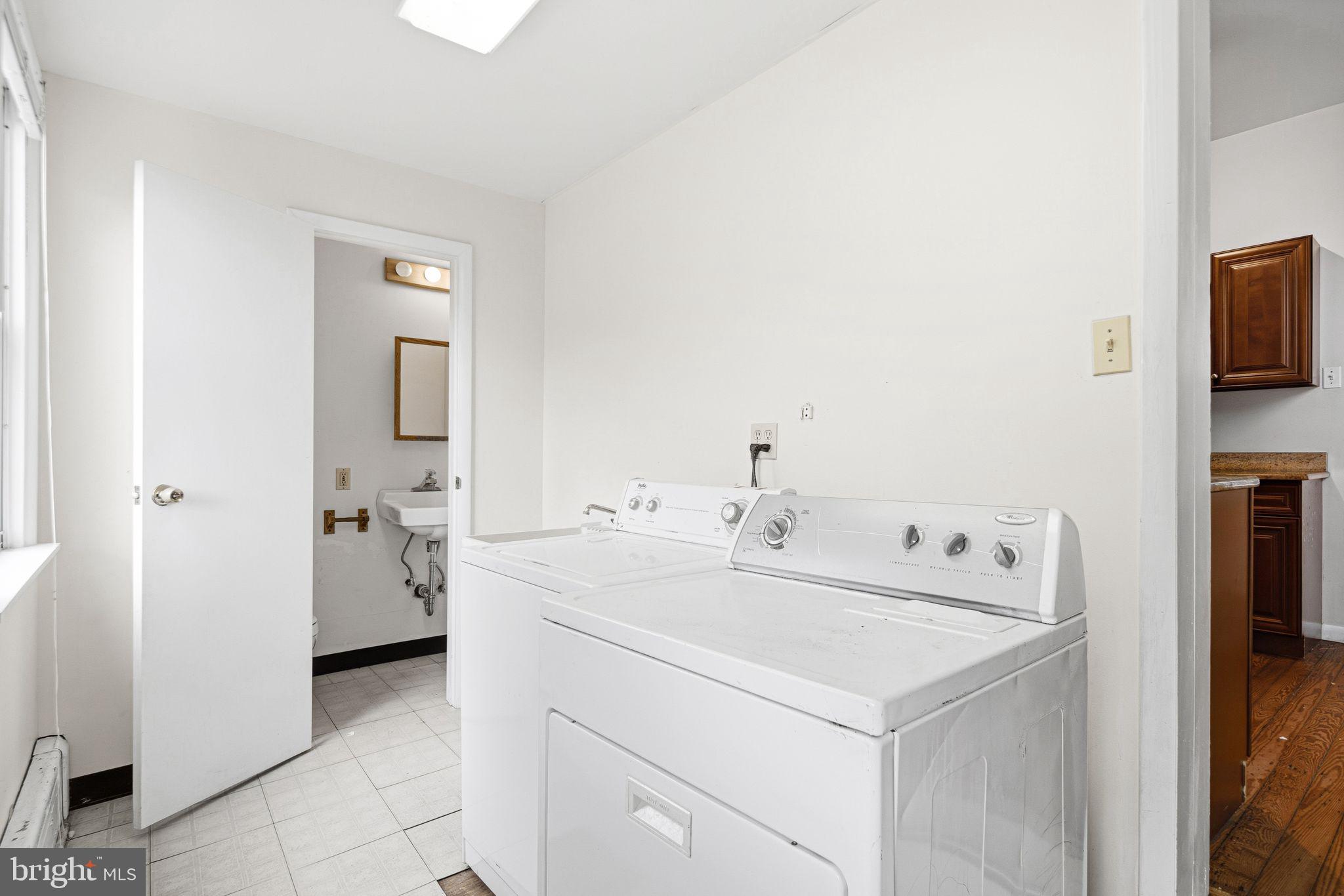 542 Martin Street Philadelphia, PA 19128 - Photo 9 of 16 a utility room with dryer and washer