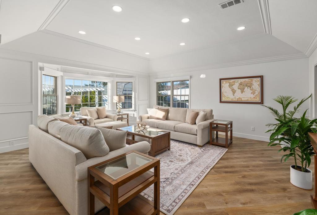 9 Country Glen Road Fallbrook, CA 92028 - Photo 11 of 74 a living room with furniture potted plant and windows