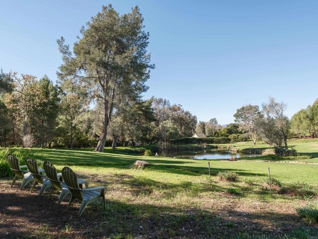 9 Country Glen Road Fallbrook, CA 92028 - Photo 13 of 74 a view of a golf course with a lake