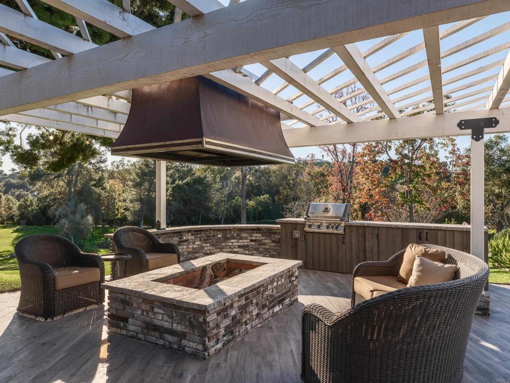 9 Country Glen Road Fallbrook, CA 92028 - Photo 15 of 74 a living room with furniture and a floor to ceiling window