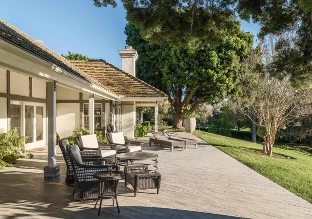 a bedroom with a bed and a lamp
