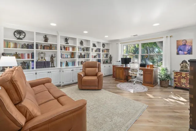 a kitchen with stainless steel appliances kitchen island granite countertop a sink and a stove