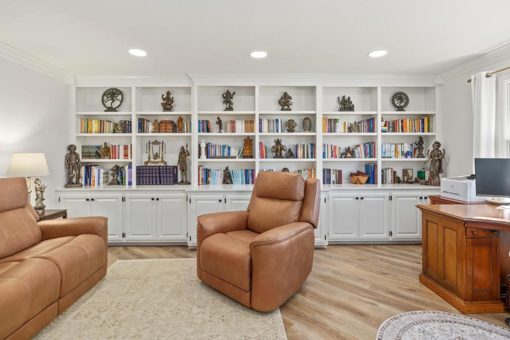9 Country Glen Road Fallbrook, CA 92028 - Photo 20 of 74 a living room with furniture and a book shelf