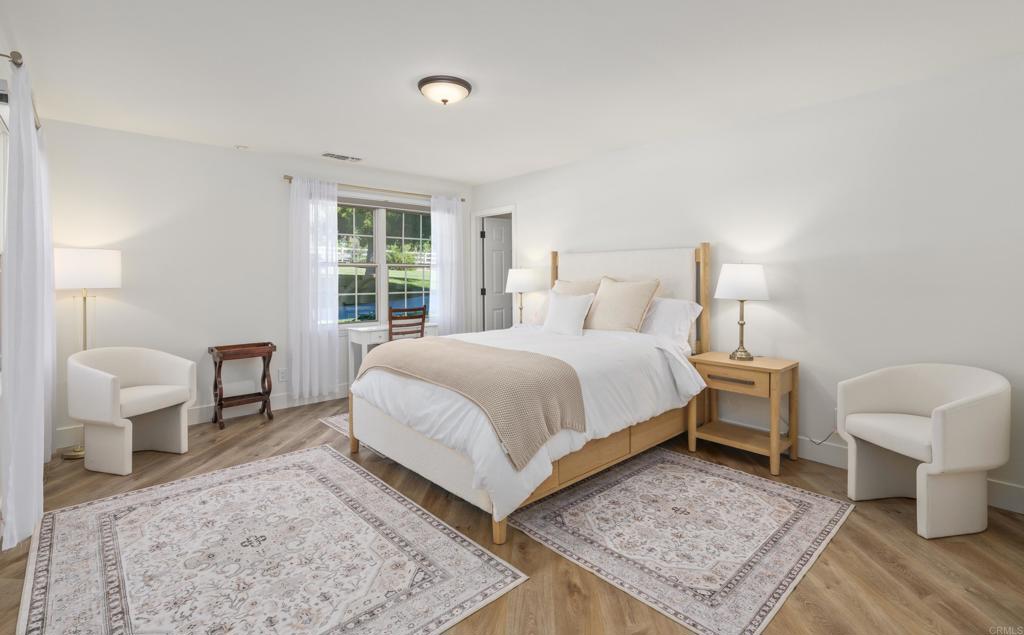 9 Country Glen Road Fallbrook, CA 92028 - Photo 32 of 74 a bedroom with a bed and window