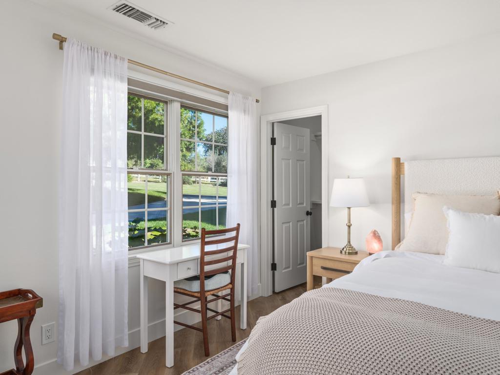 9 Country Glen Road Fallbrook, CA 92028 - Photo 33 of 74 a bedroom with a bed and a table