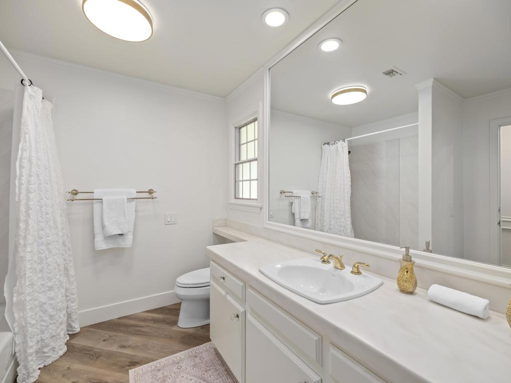 9 Country Glen Road Fallbrook, CA 92028 - Photo 35 of 74 a bathroom with a sink and a mirror
