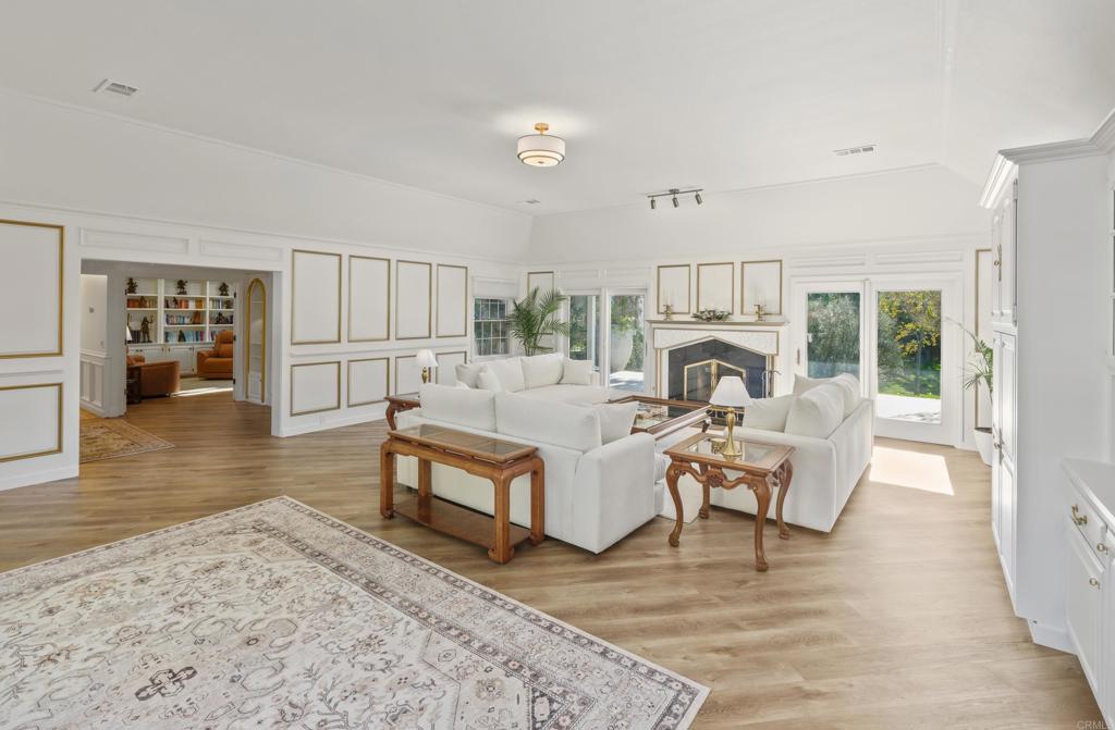 9 Country Glen Road Fallbrook, CA 92028 - Photo 44 of 74 a living room with furniture and a wooden floor