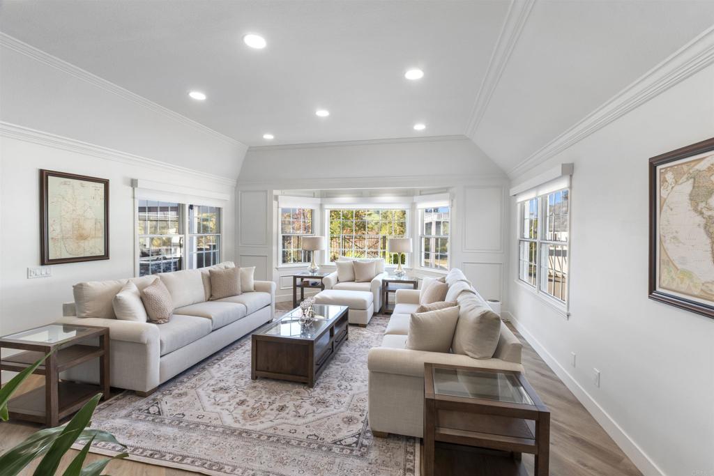 9 Country Glen Road Fallbrook, CA 92028 - Photo 49 of 74 a living room with furniture flat screen tv and window