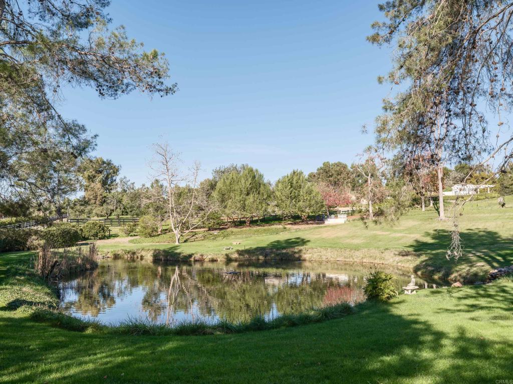 9 Country Glen Road Fallbrook, CA 92028 - Photo 56 of 74 a view of a lake with houses in the back