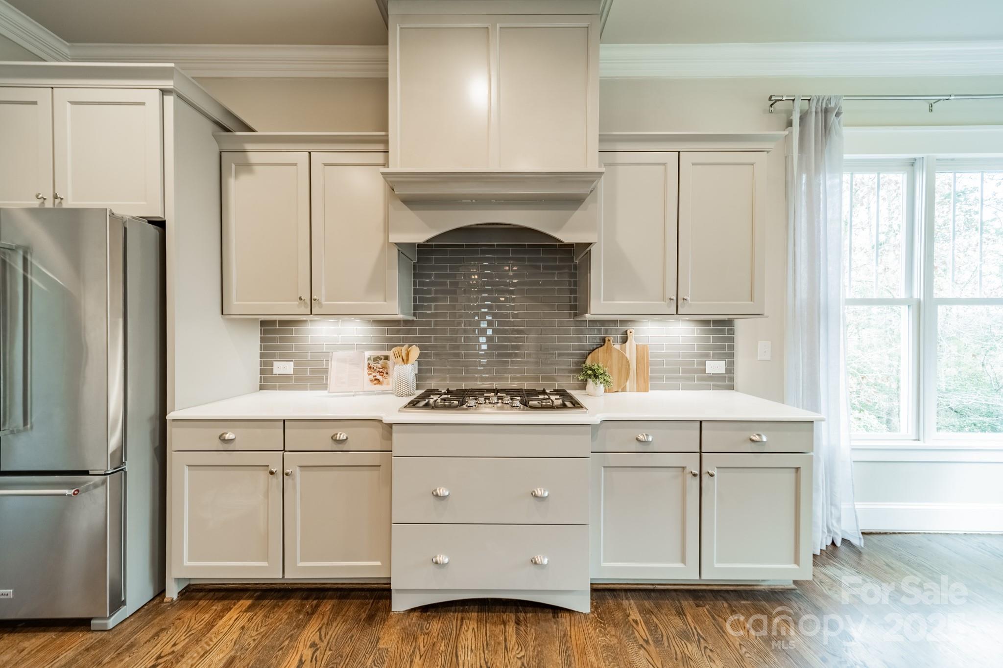 348 Meares Court Fort Mill, SC 29715 - Photo 12 of 47 a kitchen with cabinets appliances and a window
