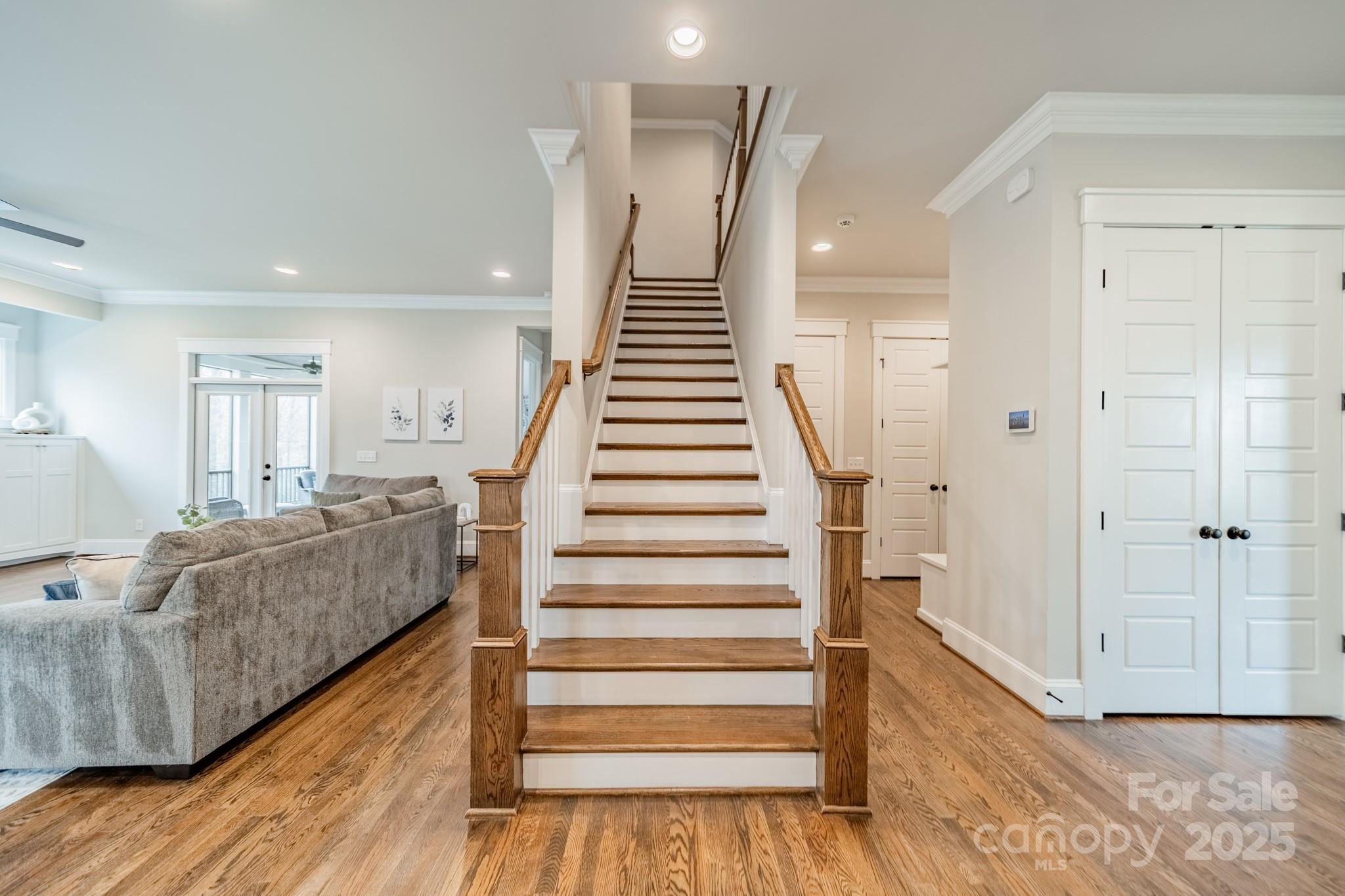 348 Meares Court Fort Mill, SC 29715 - Photo 20 of 47 a living room with furniture and a wooden floor