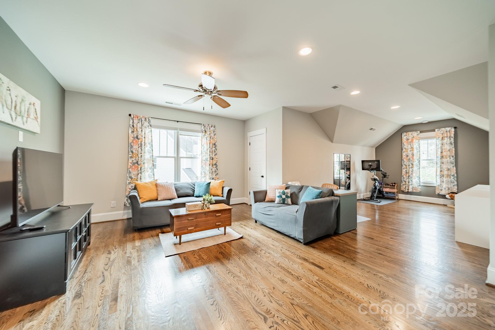 348 Meares Court Fort Mill, SC 29715 - Photo 30 of 47 a living room with furniture and a flat screen tv