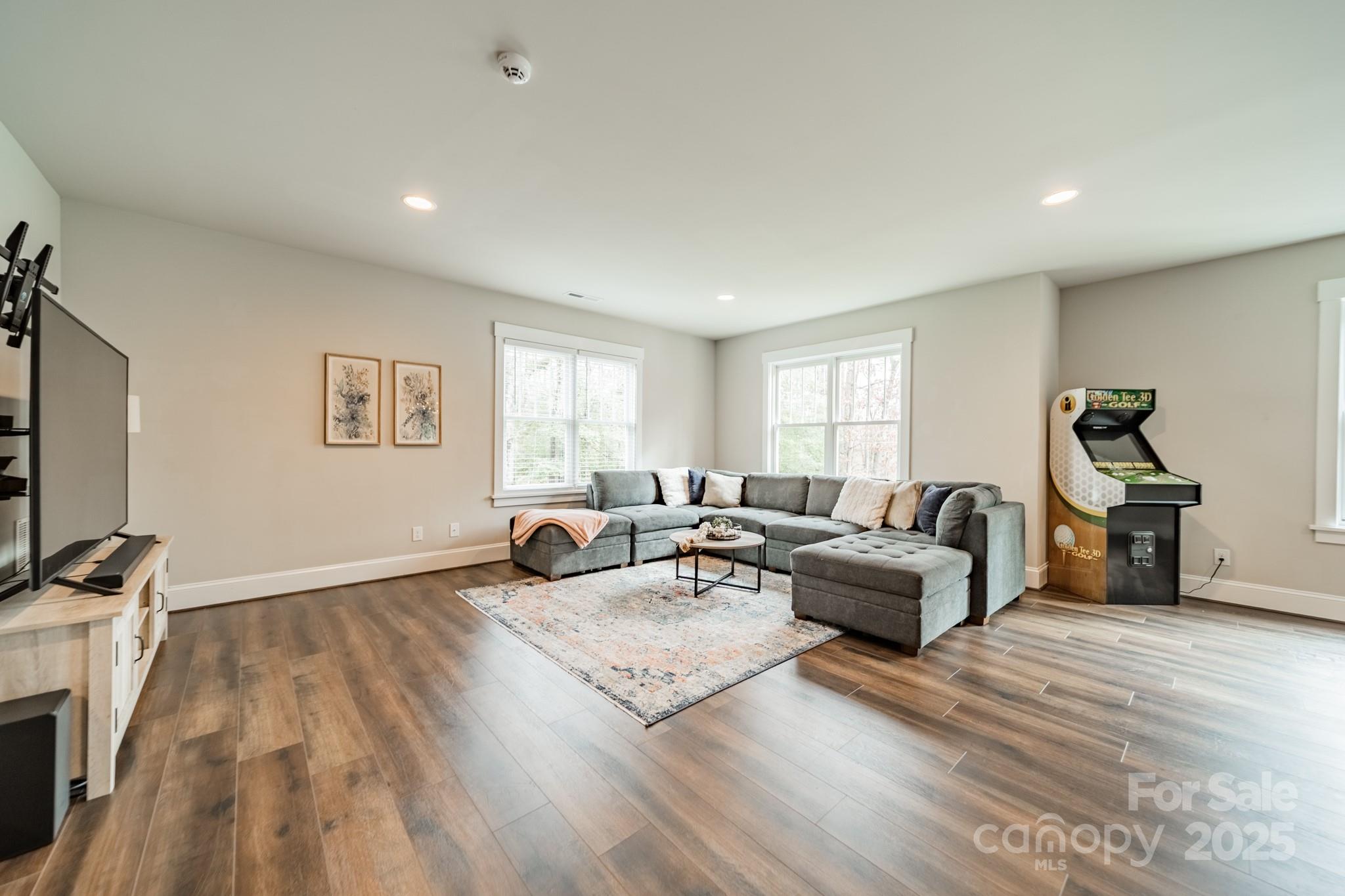 348 Meares Court Fort Mill, SC 29715 - Photo 36 of 47 a living room with furniture and a flat screen tv