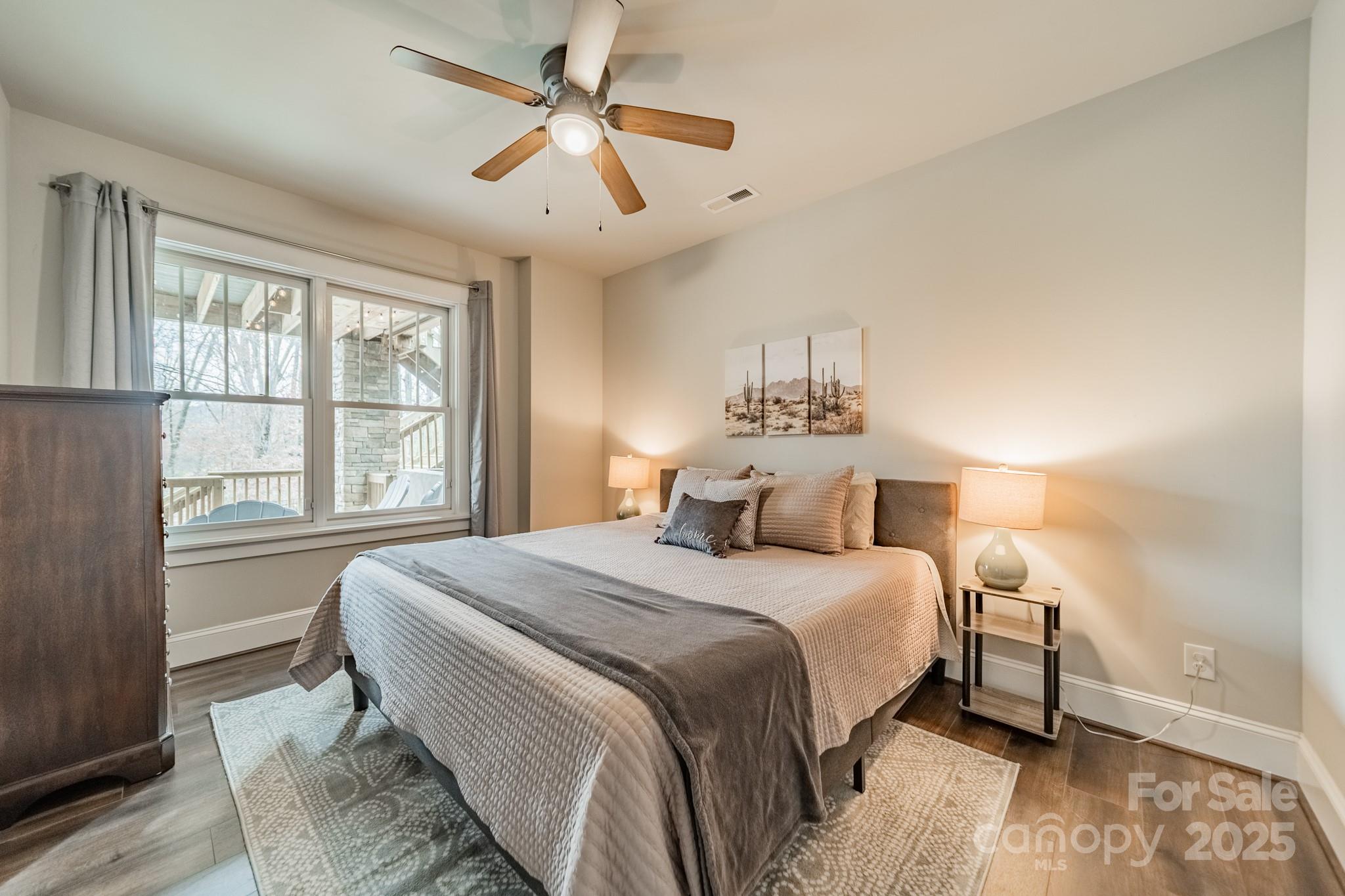 348 Meares Court Fort Mill, SC 29715 - Photo 37 of 47 a bedroom with a large bed and a large window