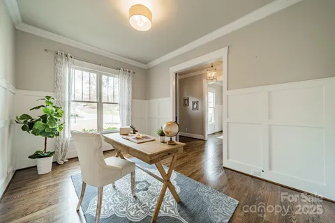 a view of a livingroom with furniture and window