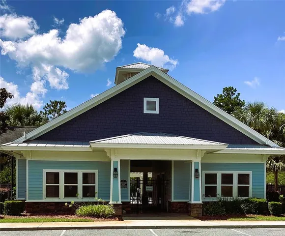 a front view of a house with a porch