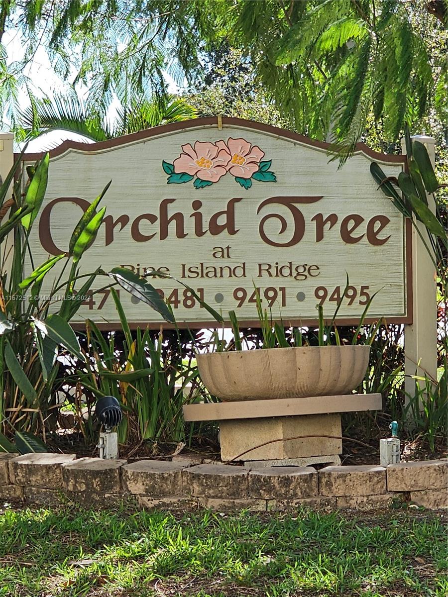 a view of a sign in a yard