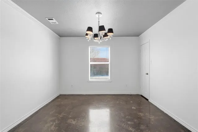 a view of a window in an empty room