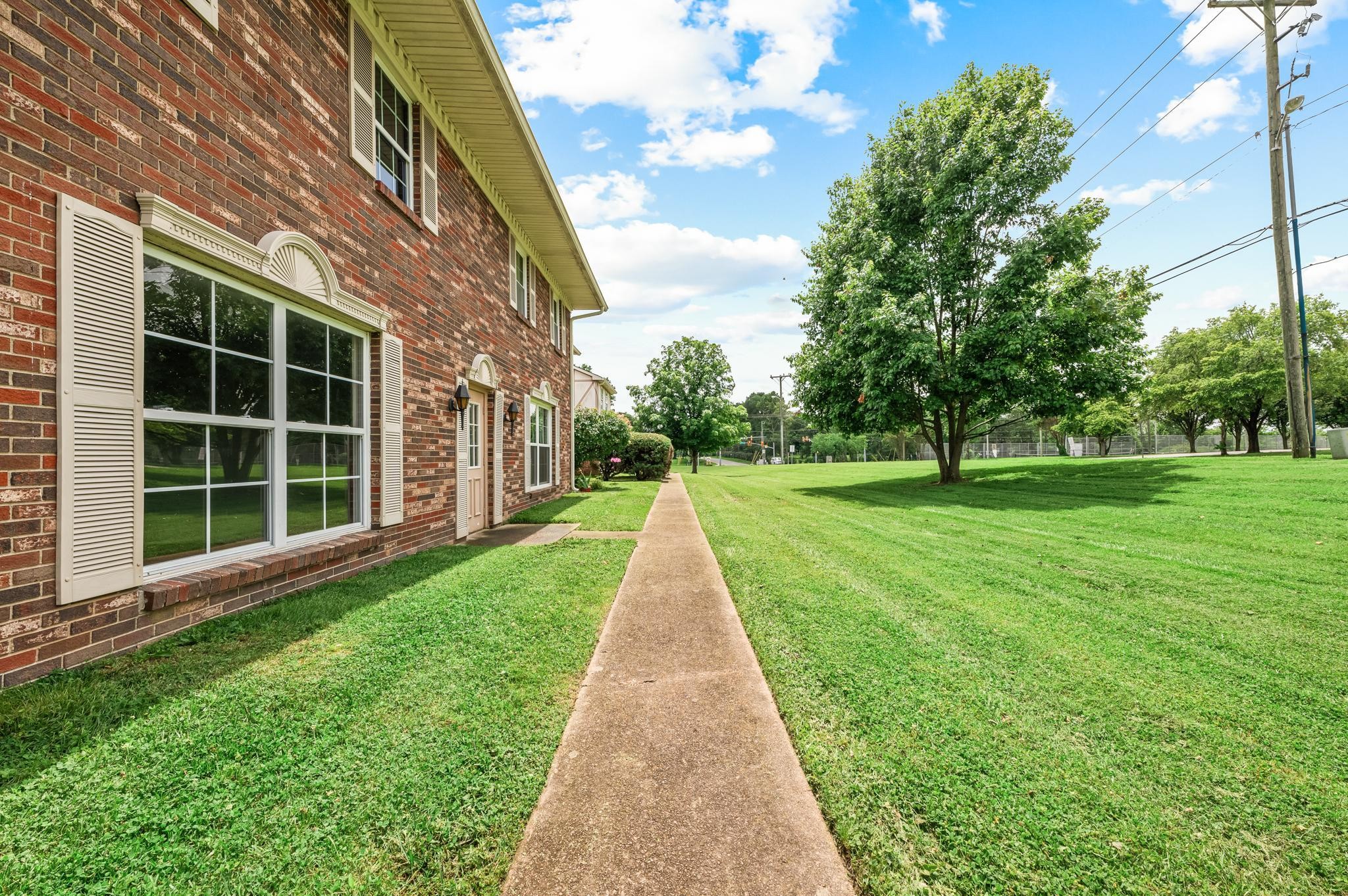 1301 Neelys Bend Road, Unit 30 Madison, TN 37115 - Photo 15 of 15 a view of a house with backyard