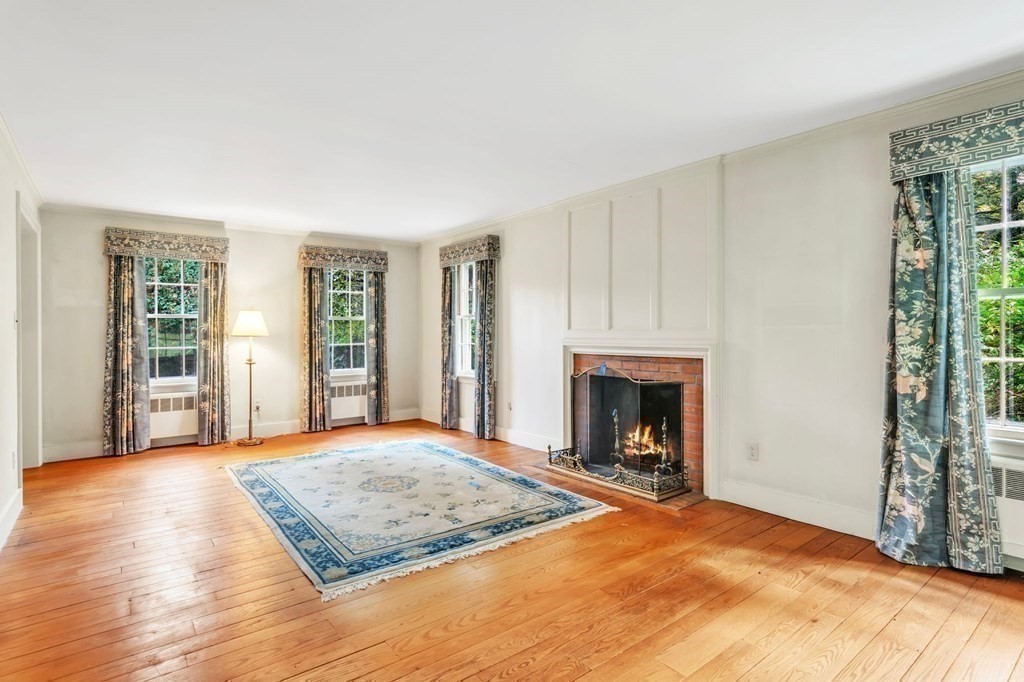 30 Green River Road Greenfield, MA 01301 - Photo 21 of 34 a view of an empty room with window and fire place