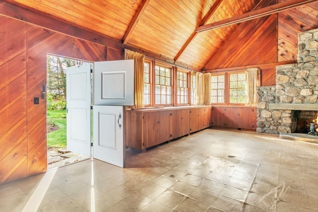 30 Green River Road Greenfield, MA 01301 - Photo 9 of 34 a view of an empty room with a fireplace