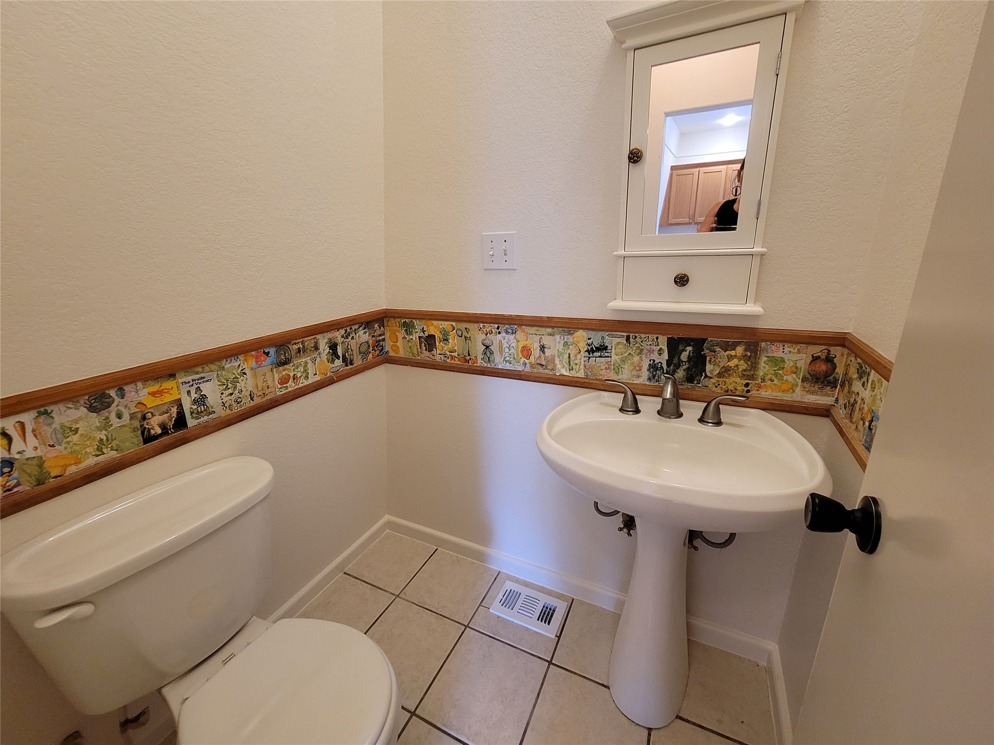 281 Earl Callahan Road, Unit A Cedar Creek, TX 78612 - Photo 17 of 39 a bathroom with a sink mirror and toilet
