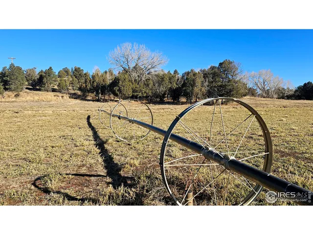 a view of swimming pool from a balcony
