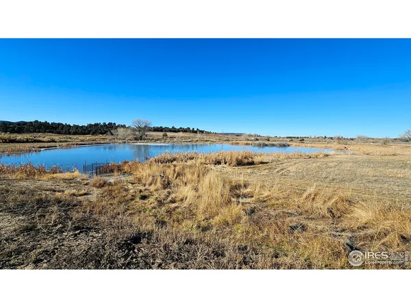 a open area with lake view and mountain view