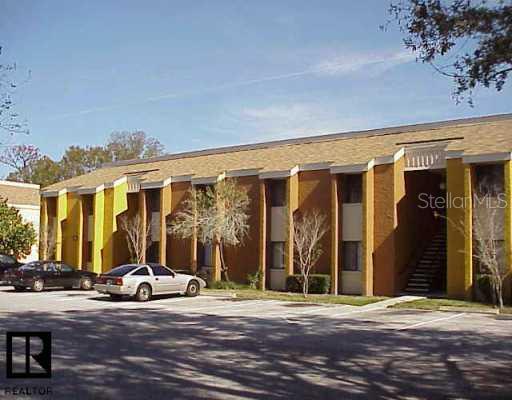 2225 Nursery Road, Unit 102 Clearwater, FL 33764 - Photo 1 of 1 Exterior Front - Oakbrook Village Bldg 14 #102 2225 Nursery Rd