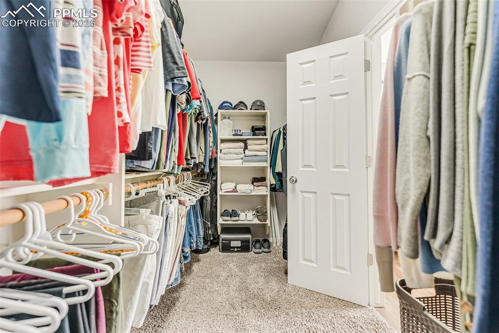 10467 Pictured Rocks Drive Peyton, CO 80831 - Photo 23 of 47 a view of walk in closet with clothes and shoes