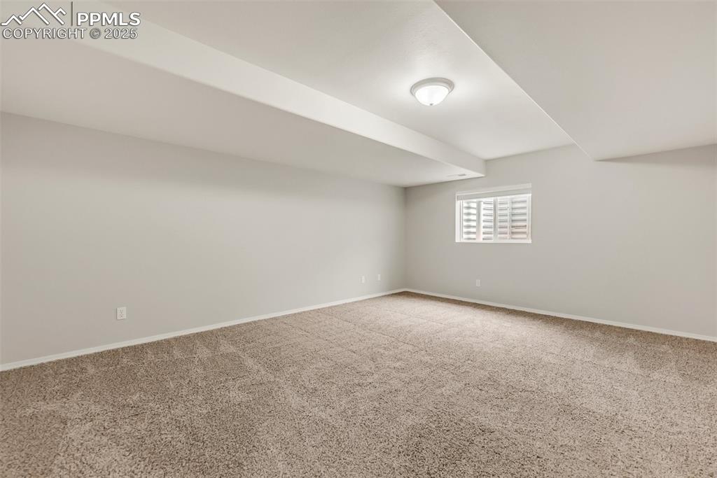 10467 Pictured Rocks Drive Peyton, CO 80831 - Photo 37 of 47 an empty room with a empty space and windows