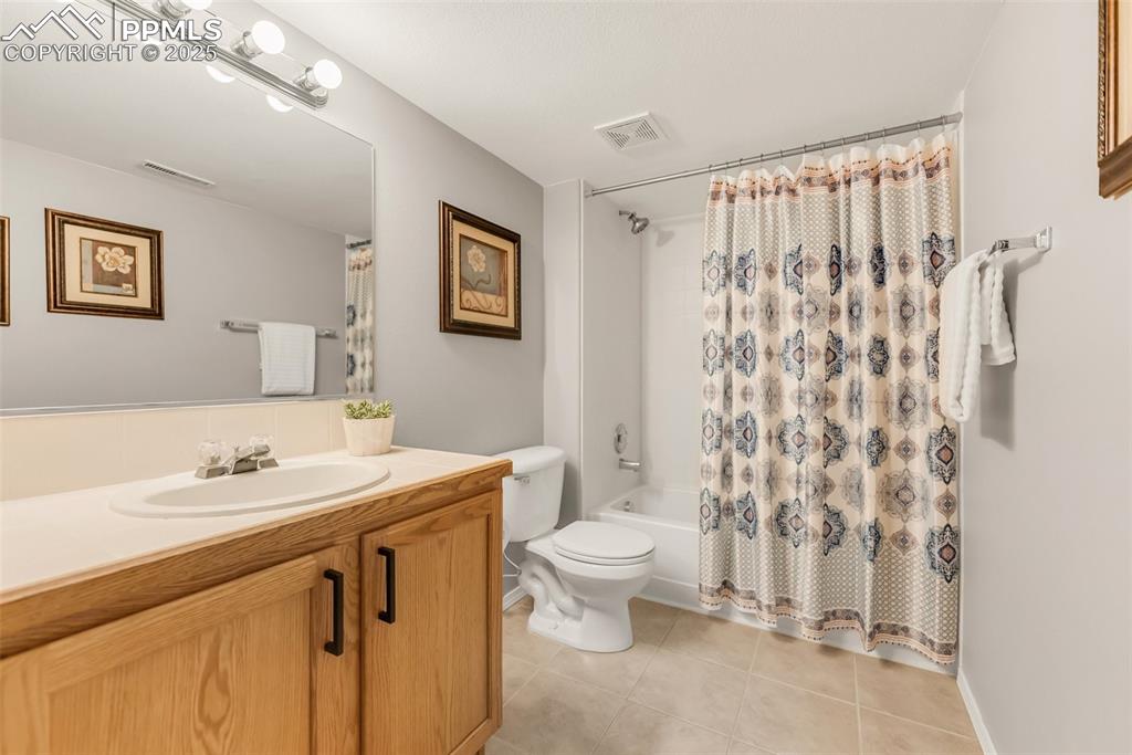 10467 Pictured Rocks Drive Peyton, CO 80831 - Photo 39 of 47 a bathroom with a sink toilet and shower