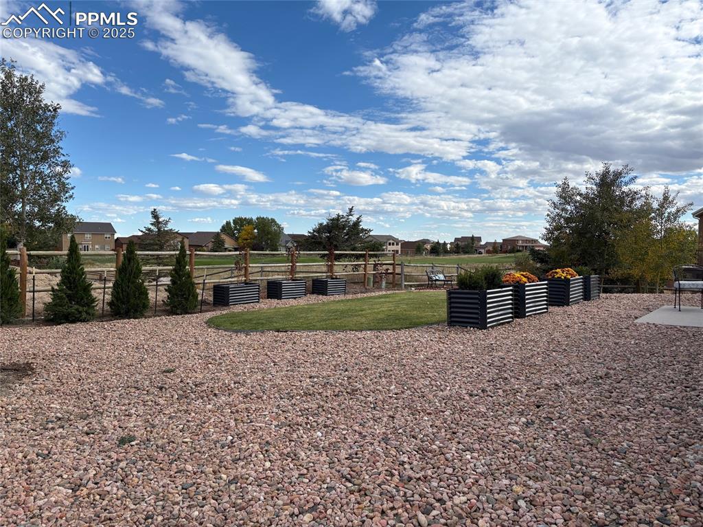 10467 Pictured Rocks Drive Peyton, CO 80831 - Photo 45 of 47 a view of a house with a yard